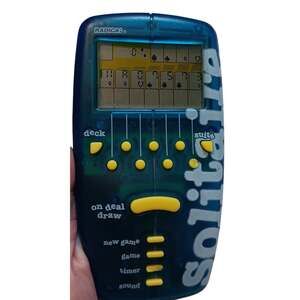 Radica Pocket Solitaire Vintage 1998 (Model 9916) electronic handheld card game.